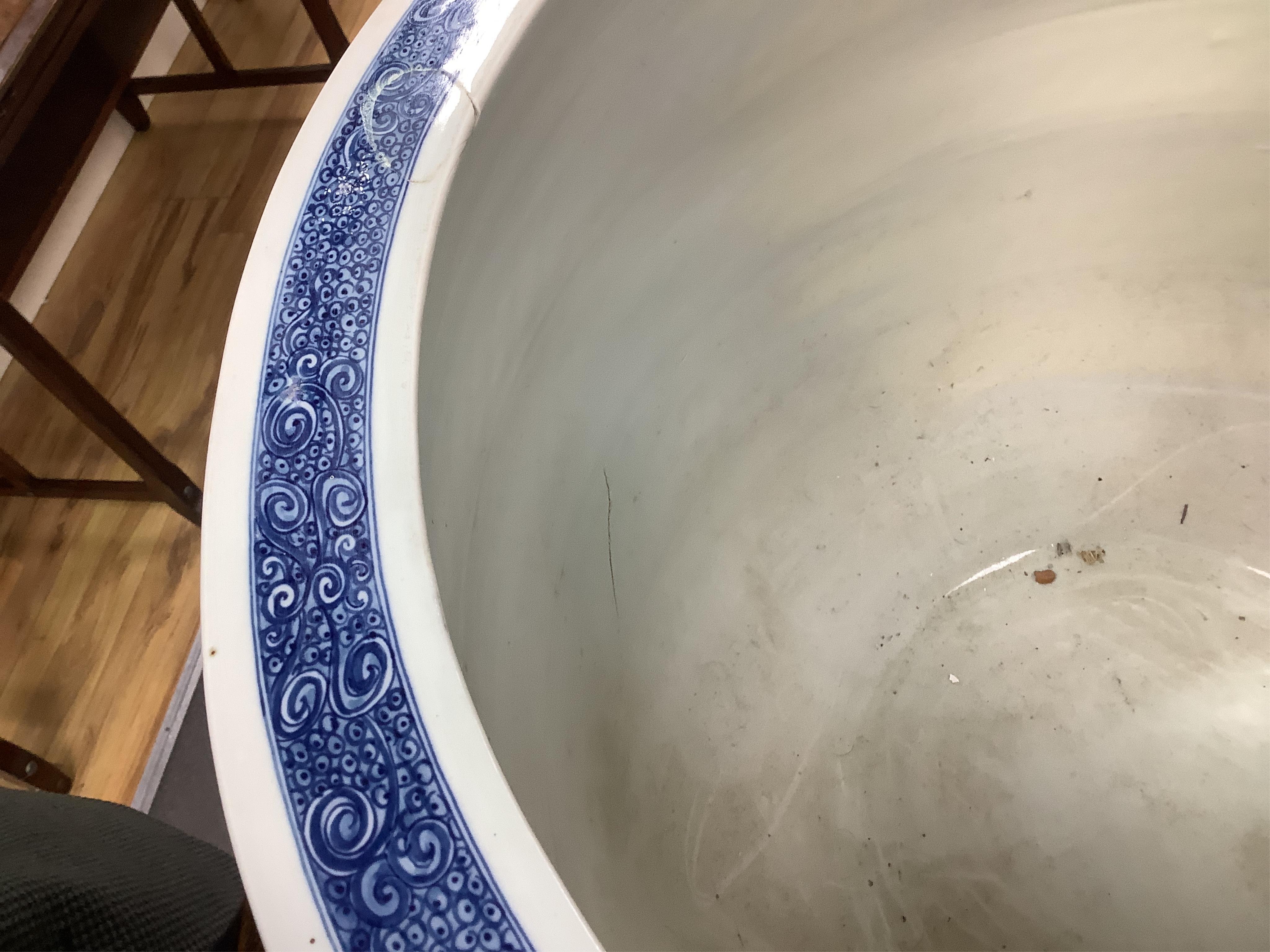 A massive Chinese blue and white fish bowl, 48cm high. Condition - good